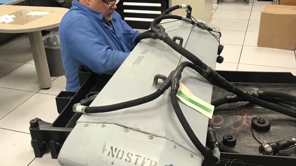 Universal Synaptics, A-10 EWIS Testing Project at Hill AFB, Utah
Tony Iseminger, Technical Director, connects an A-10 DRA through existing USAF procured interface cables to the Intermittent Fault Detector (IFD) via an AWTS / PATS-70 patch cable. Several intermittent faults were detected and isolated in the AWTS / PATS-70 cables, as well as the Unit Under Test (UUT) that conventional ATE is incapable of detecting or isolating.